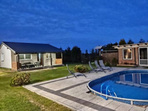 Domek parterowy apartamentowy Ostoja Rewal